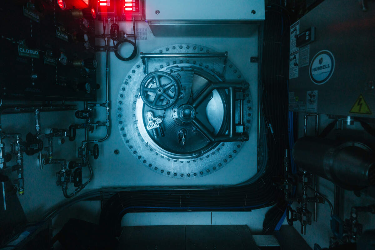 The hatch between the living chamber and dive center.
